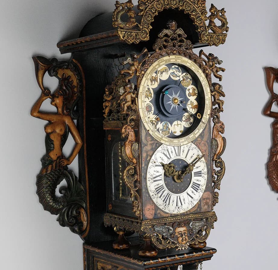 Ornate CVDK astronomical wall clock